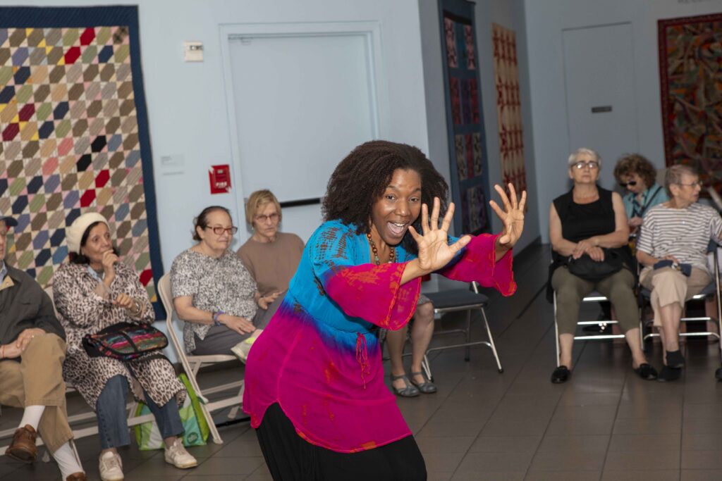Gallery image of Onome leading "Vocal Tapestry" at American Folk Art Museum