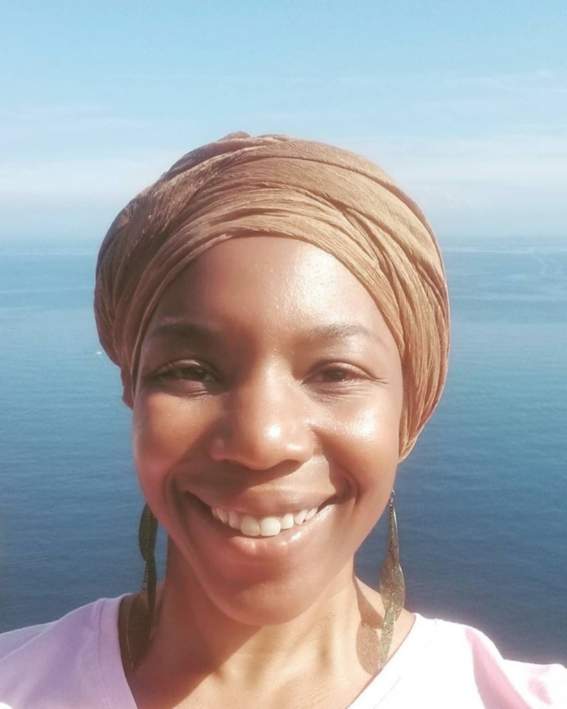 Promotional picture of Onome in front of the Mediterranean Sea.